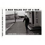 A MAN WALKS OUT OF A BAR…